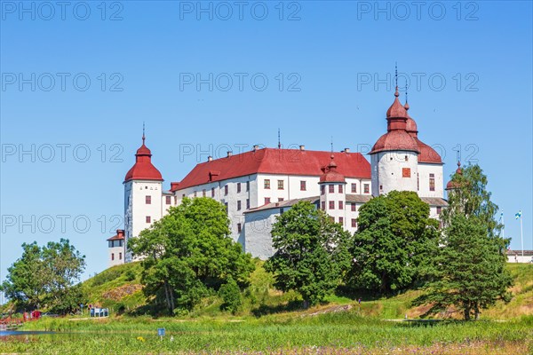 Lacko castle a famous white baroque castle by Lake Vanern in the summer, Laeckoe, Lidkoeping, Sweden, Europe