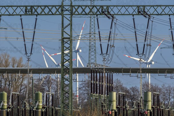 Stendal West substation with wind turbines in the background near Luederitz, Stendal, Saxony-Anhalt, Germany, Europe