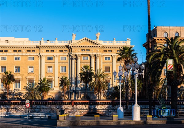 Promenade along the old harbour with prestigious buildings in Barcelona, Spain, Europe