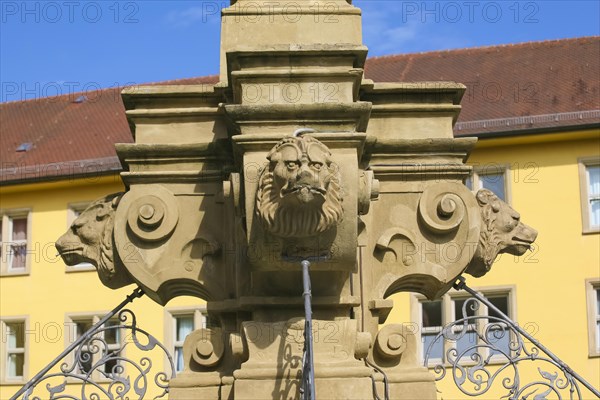 Fountain with lion heads, stone figures, Winnental Castle built in the 15th century by the Teutonic Knights as the seat of the Winnender Kommende, former castle of the Teutonic Order, today Winnenden Castle Clinic Centre for Psychiatry, castle building, historical building, architecture, castle park, Winnenden, Rems-Murr-Kreis, Baden-Wuerttemberg, Germany, Europe