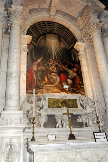 Interior view of the church of Santa Maria della Salute, Venice, An illuminated altar with magnificent paintings and sculptures in a church, Venice, Veneto, Italy, Europe