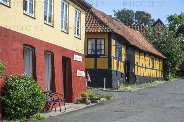 Typical colored red and yellow houses on Bornholm island, Baltic Sea, Denmark, Scandinavia, Northern Europe, Europe
