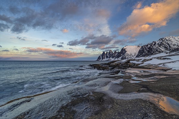 Rocky coast off Bergen, sea, waves, morning mood with clouds, winter, Tungeneset, Senja, Troms, Norway, Europe