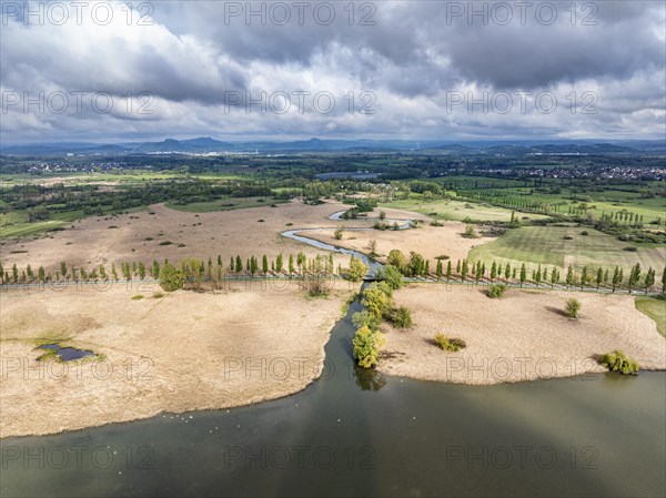 Aerial view of the Radolfzeller Aach, which flows into western Lake Constance surrounded by a belt of reeds, behind it the Raolfzeller Aachried, on the horizon the Hegauberge, district of Constance, Baden-Wuerttemberg, Germany, Europe