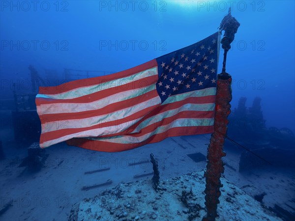 US flag waving in the current on the wreck of the USS Spiegel Grove, dive site John Pennekamp Coral Reef State Park, Key Largo, Florida Keys, Florida, USA, North America