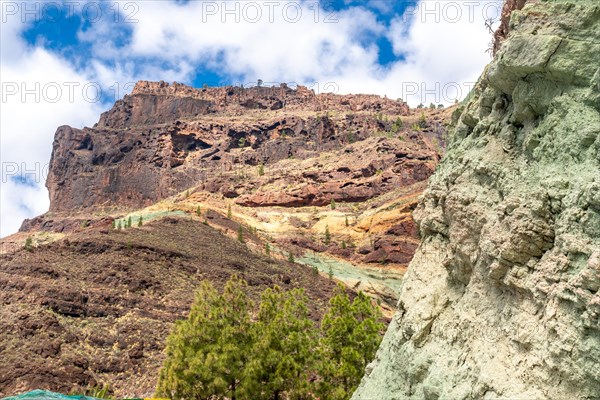 Beautiful landscape in the natural monument at the Azulejos de Veneguera or Rainbow Rocks in Mogan, Gran Canaria