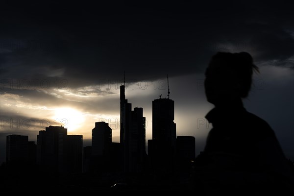 Dense clouds pass over the Frankfurt banking skyline in the evening, Floesserbruecke, Frankfurt am Main, Hesse, Germany, Europe