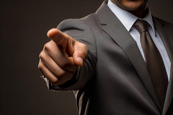 Man in business suit pointing finger at camera. KI generiert, generiert, AI generated