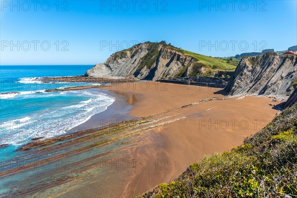 Itzurun beach without people in the Flysch Basque Coast geopark in Zumaia, Gipuzkoa