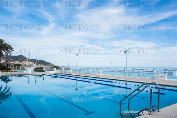 Swimming pool on the beach in Sitges, Spain, Europe