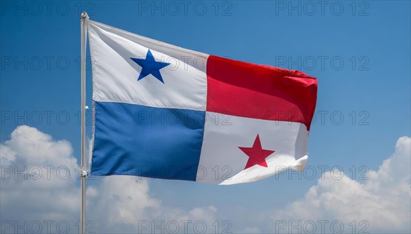 The flag of Panama flutters in the wind, isolated against a blue sky