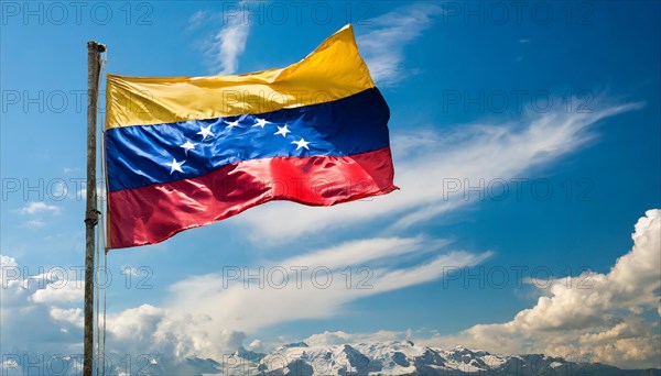 The flag of Venezuela, fluttering in the wind, isolated against a blue sky