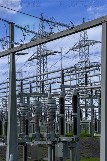 Power pylons with high-voltage lines and insulators at the Avacon substation in Helmstedt, Helmstedt, Lower Saxony, Germany, Europe