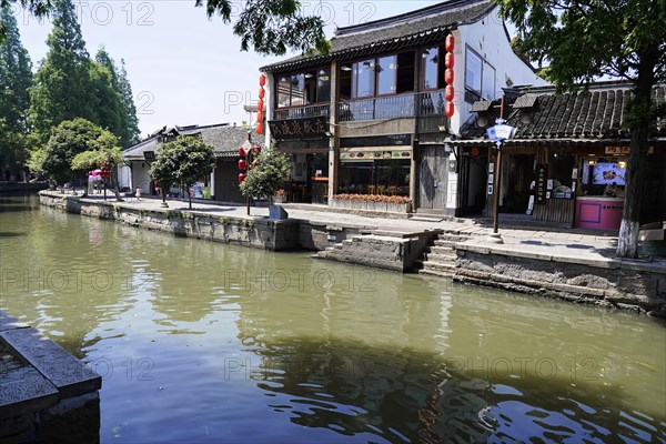 Excursion to Zhujiajiao Water Village, Shanghai, China, Asia, Traditional buildings along a tranquil water canal, Asia