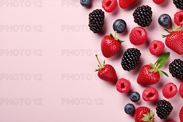 Berry fruit mix on pink background with copy space. KI generiert, generiert, AI generated
