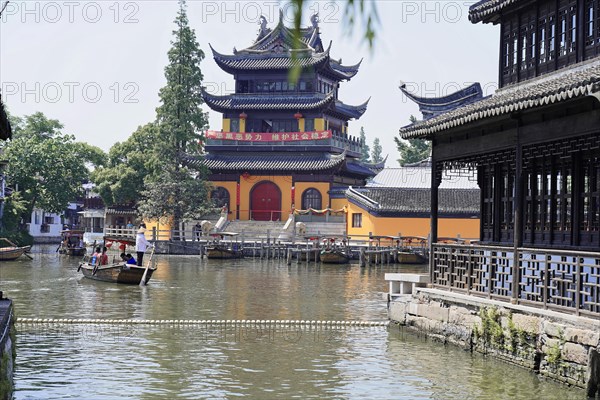 Excursion to Zhujiajiao water village, Shanghai, China, Asia, wooden boat on canal with views of historic architecture, Asia