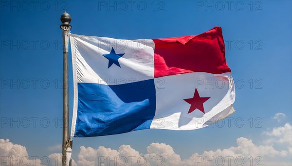 The flag of Panama flutters in the wind, isolated against a blue sky