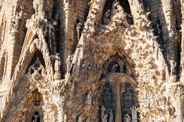 Birth facade of the Sagrada Familia basilica, Roman Catholic basilica by Antoni Gaudi in Barcelona, Spain, Europe