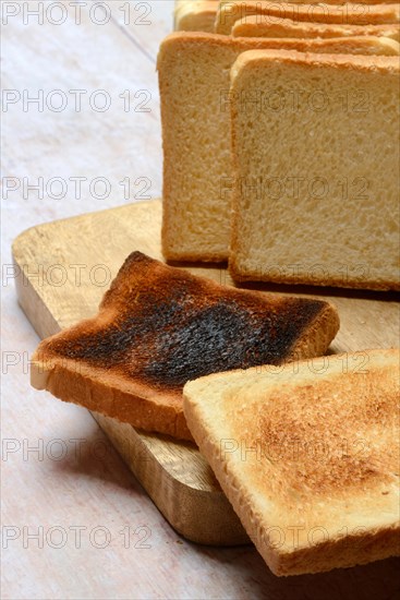 Burnt slice of toast with toast, toast