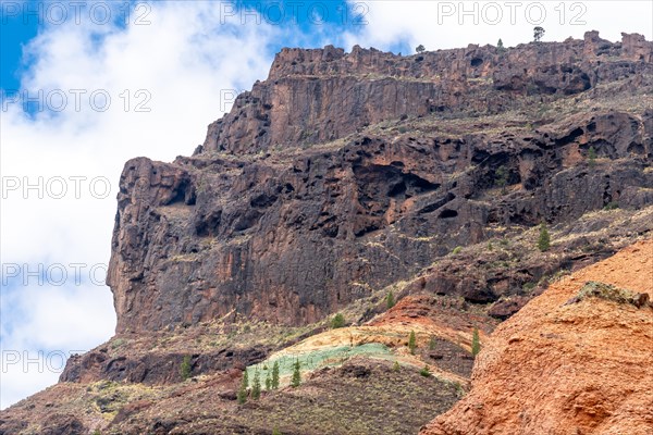 Detail of the colors in the Natural Monument Azulejos de Veneguera or Rainbow Rocks in Mogan, Gran Canaria