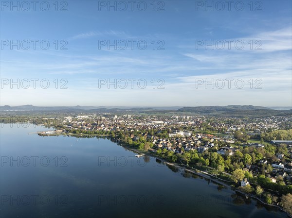 Aerial view of the town of Radolfzell on Lake Constance with the front part of the Mettnau peninsula and Waeschbruckhafen harbour, on the horizon the Hegauberge mountains, district of Constance, Baden-Wuerttemberg, Germany, Europe
