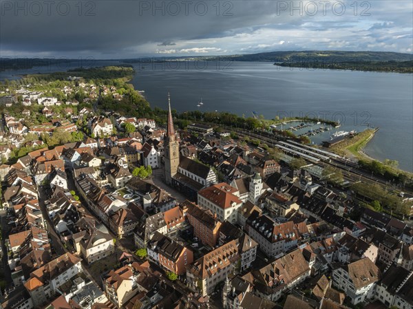 Aerial view of the town of Radolfzell on Lake Constance with the Radolfzell Minster in front of sunset, district of Constance, Baden-Wuerttemberg, Germany, Europe