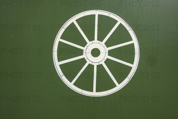 Wheel symbol, historic Zum Rad inn, building from the 16th century in the old town centre of Wangen im Allgaeu, Baden-Wuerttemberg, Germany, Europe