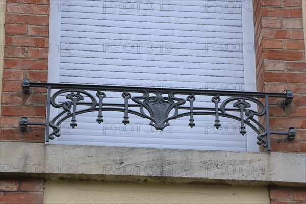 Window railings and balconies on residential buildings designed by Hector Guimard in the Art Nouveau style and produced in the municipal metal foundry Fonderies de Saint-Dizier, Saint-Dizier, Haute-Marne department, Grand Est region, France, Europe