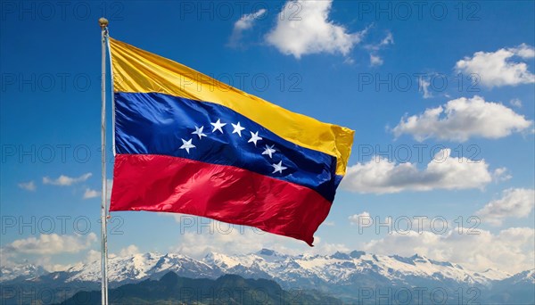 The flag of Venezuela, fluttering in the wind, isolated against a blue sky