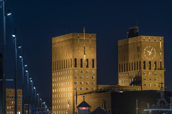 Illuminated Oslo City Hall, Aker Brygge, Oslo, Norway, Europe