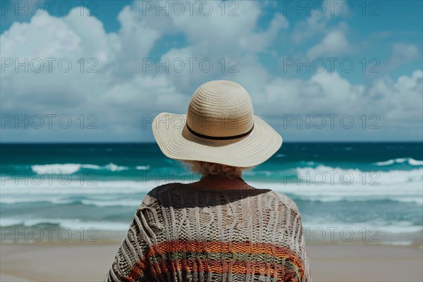 Back view of senior woman at beach. KI generiert, generiert, AI generated