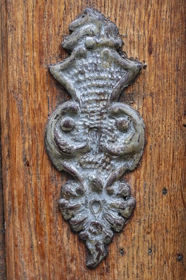 Application on wood, antiqued door fitting on a historic front door, Old Town Lindau (Lake Constance), Bavaria, Germany, Europe