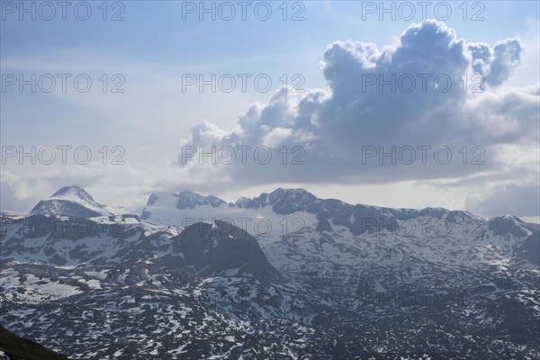 Amazing mountains panorama from 5 Fingers viewing platform in the shape of a hand with five fingers on Mount Krippenstein in the Dachstein Mountains of Upper Austria, Salzkammergut region, Austria, Europe