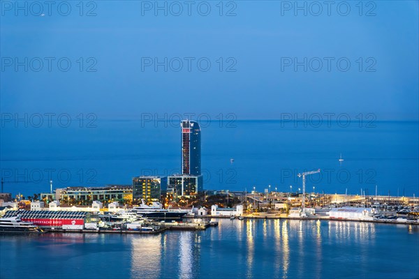 View of the old harbour and the city of Barcelona at night, Barcelona, Spain, Europe