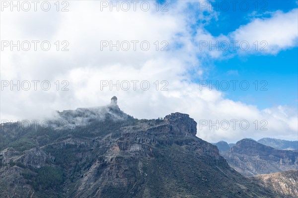 Beautiful landscape of Roque Nublo with fog from a viewpoint. Gran Canaria, Spain, Europe
