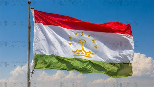 The flag of Tajikistan, fluttering in the wind, isolated, against the blue sky