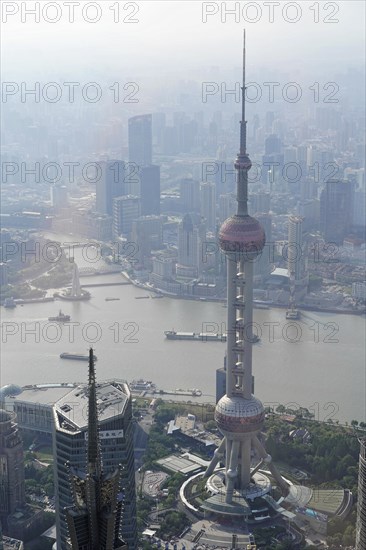 View from the 632 metre high Shanghai Tower, nicknamed The Twist, Shanghai, People's Republic of China, Foggy view of a tower and the surrounding metropolitan panorama, Shanghai, China, Asia