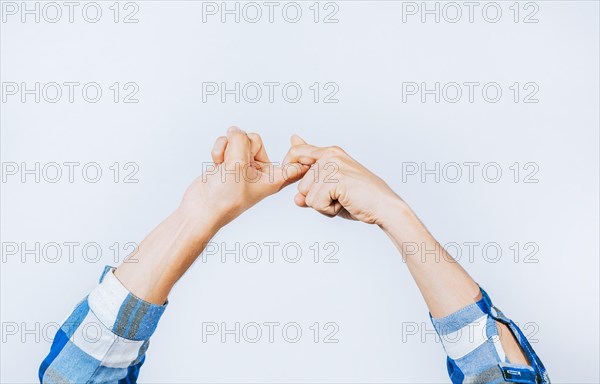 Friendship concept in sign language. Hands gesturing FRIENDSHIP symbol in sign language