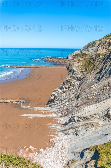 Itzurun beach without people in the Flysch Basque Coast geopark in Zumaia, Gipuzkoa