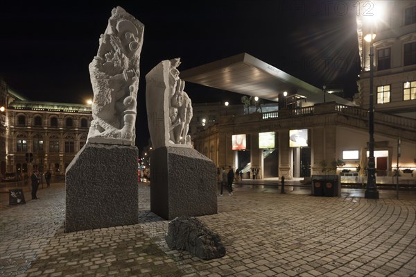 Night shot of the memorial against war and fascism, 1988, by Alfred Hrdlicka, 1928-2009, on the right the Albertina, Albertinaplatz, Vienna, Austria, Europe
