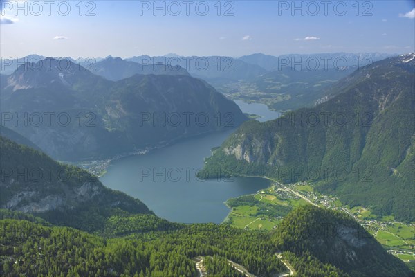 Amazing mountains panorama from 5 Fingers viewing platform above Hallstatt village, Hallstaettersee lake and the inner Salzkammergut region on Mount Krippenstein in the Dachstein Mountains, Austria, Europe