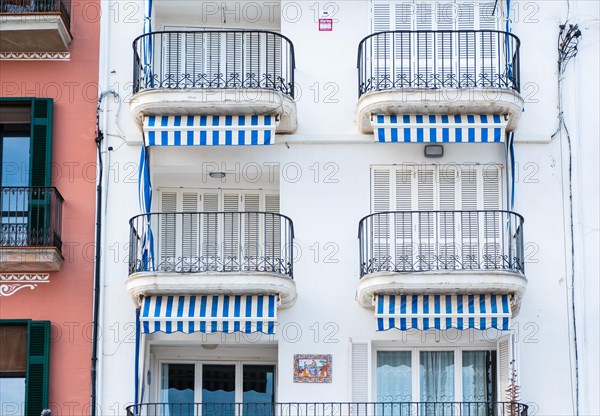 Balconies of a hotel on the seafront promenade in Sitges, Spain, Europe