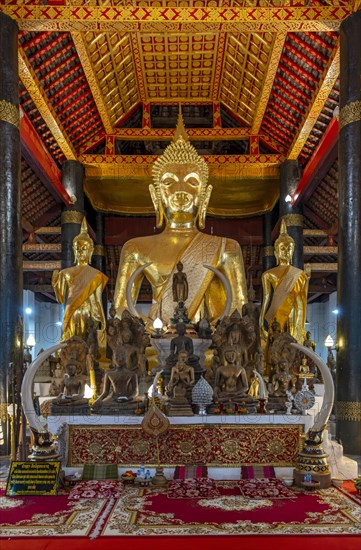 Collection of Buddha images at Wat Wisunarat temple, Luang Prabang, Laos, Asia
