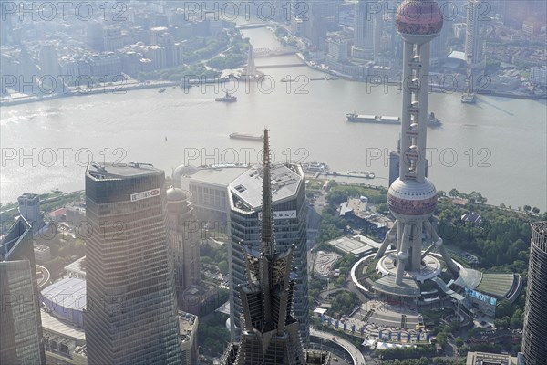 View from the 632 metre high Shanghai Tower, nicknamed The Twist, Shanghai, People's Republic of China, Clear view of an urban skyline with a prominent tower and river, Shanghai, China, Asia