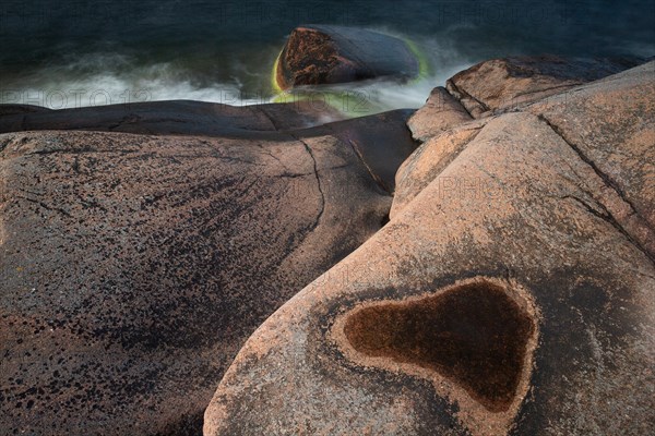 Red granite, rocky coast, surf, long exposure, Havsvidden, Geta, Aland, Aland Islands, Finland, Europe