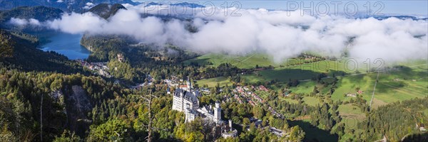 Neuschwanstein Castle and the Alpsee, near Hohenschwangau, Romantic Road, Ostallgaeu, Bavaria, Germany, Europe