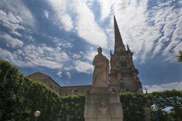 Cathedral Notre Dame de l'Assomption, the tower dates from the 19th century, in front a monument to Richelieu, cardinal and statesman, was bishop of the city from 1607-1624, Lucon, Vendee, France, Europe