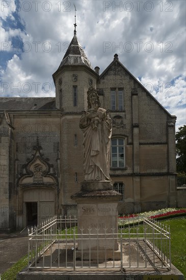 Sculpture of the Virgin Mary in front of Notre Dame de l'Assomption Cathedral, Lucon, Vendee, France, Europe