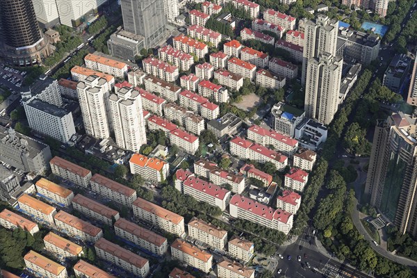 View from the 632-metre-high Shanghai Tower, nicknamed The Twist, Shanghai, People's Republic of China, aerial view of an urban residential area with colour-coordinated roofs, Shanghai, China, Asia