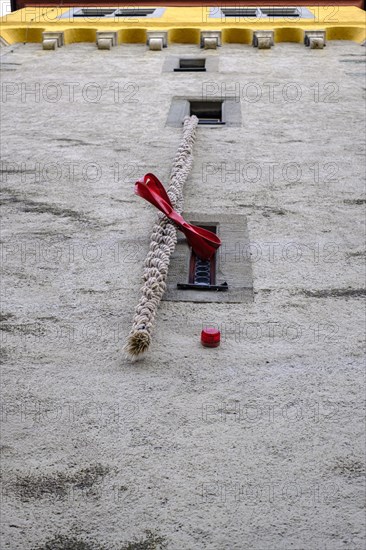 Rapunzel plait hanging down from the tower window, Mang Tower at the harbour in the old town of Lindau (Lake Constance), Bavaria, Germany, Europe